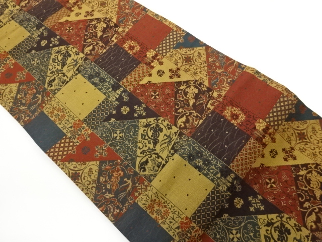 切り嵌め風花唐草に花鳥模様織出し名古屋帯